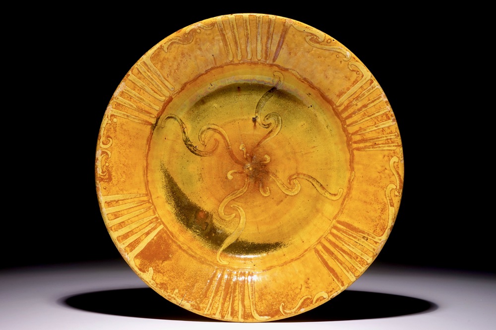 Alfred William Finch (1854 &ndash;1930): A large yellow-glazed slip-decorated ceramic dish